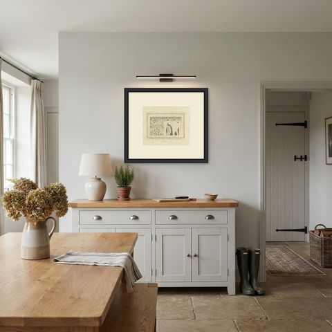 Hieroglyphs and Figures from a Granite Chest, Niebuhr Plate XXXIII, 1776, shown framed in a room