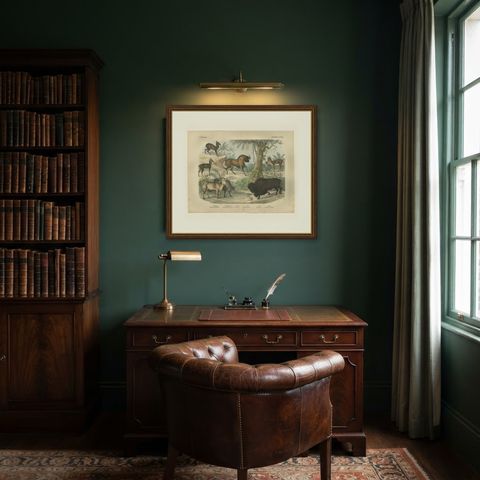 Antique Bison and Wildebeest Print with Zebu and Gazelle, Kolb, circa 1890, shown framed in a room