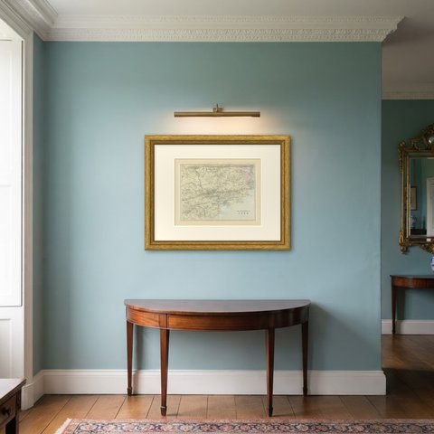 Antique Map of the Environs of Cork with its Harbor and Islands, 1885, shown framed in a room