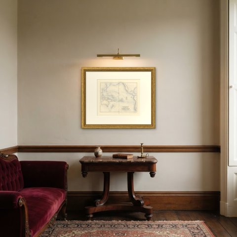 Antique Map of Oceania and the Pacific with the Sandwich Islands, circa 1860, shown framed in a room
