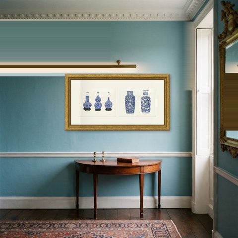 Lotus Arabesque Vases in Underglaze Blue, Two Kang-he Plates, 1911, shown framed in a room