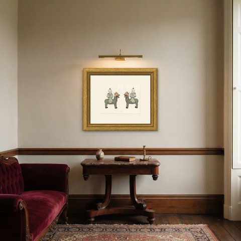 Pair of Ho Ho Erh Hsien Mounted on Kilins, Antique Color Plate 1911, shown framed in a room