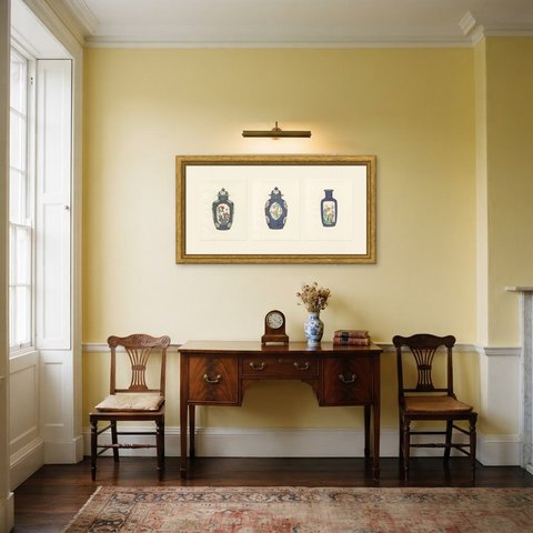 Powder-blue and Gold with Famille Verte, Three Kang-he Plates, 1911, shown framed in a room