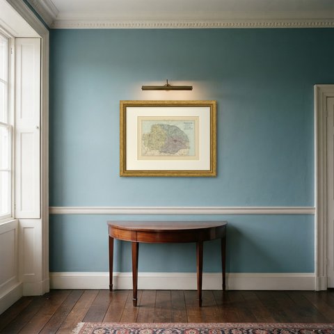 Antique Map of Norfolk with Norwich and the Wash, Edward Weller, 1885, shown framed in a room