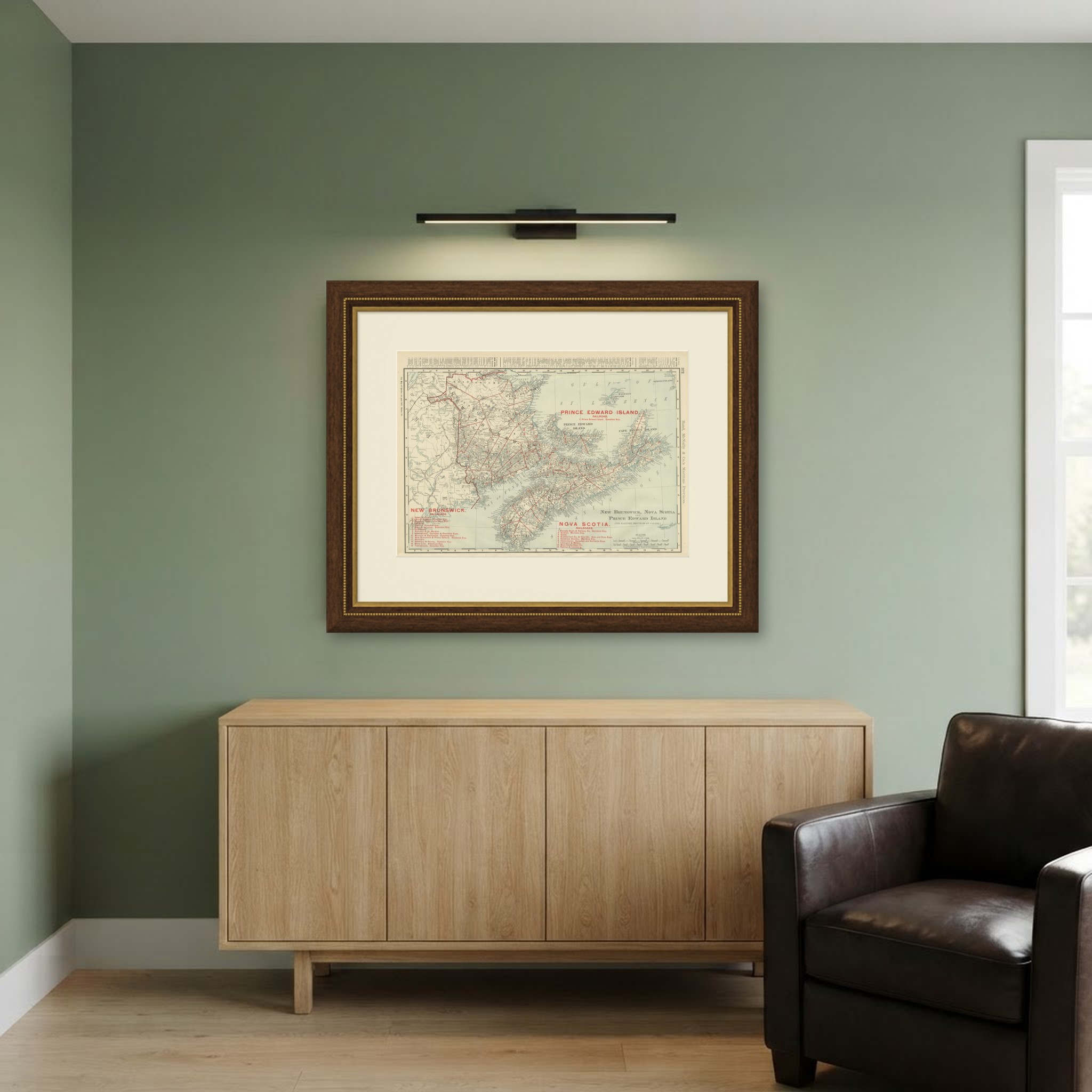 Antique Maritimes Map, New Brunswick, Nova Scotia and Prince Edward Island, 1899, shown framed in a room